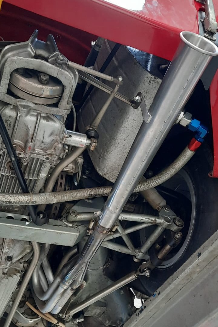 Vista dello scarico dell'Alfa Romeo Tipo 33/2 Daytona. Scarico realizzato da Giordano Competition di Giordano Marco. Competition Exhaust System.